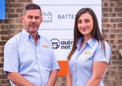 Mechanic working on a car